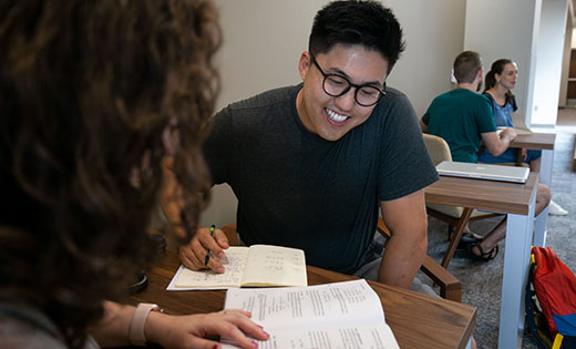 MDiv student in library