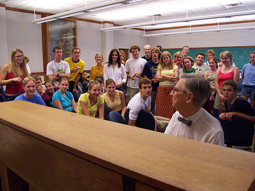 Mister Rogers playing piano for youth at Pittsburgh Theological Seminary
